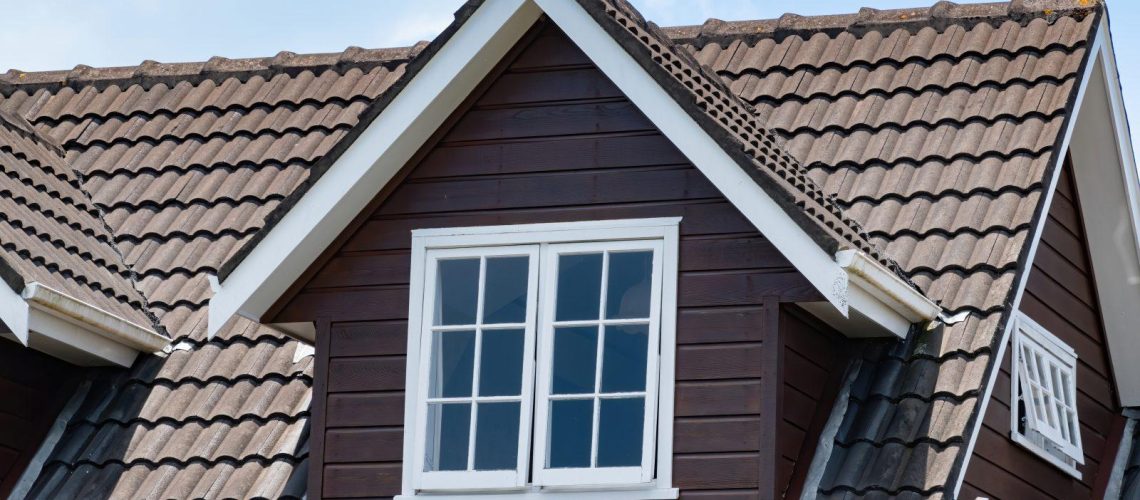 View,Of,Brown,Pitched,Roof,Dormer,Loft,With,White,Window